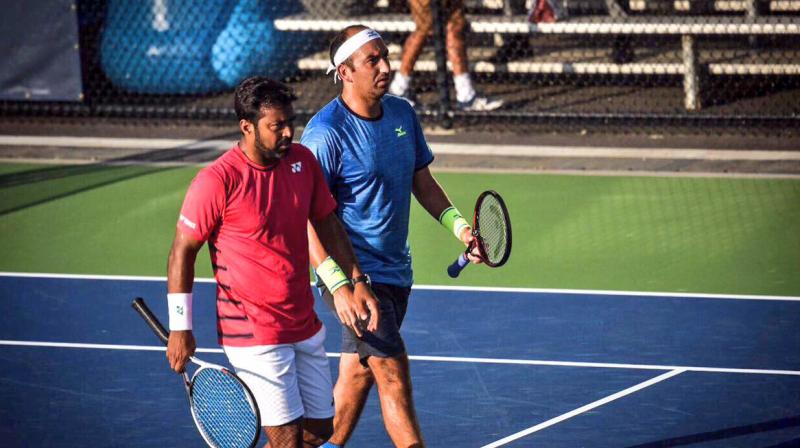 Leander Paes and Purav Raja crashed out of the Australian Open after losing to Juan Cabal and Robert Farah in Men's Double third round. (Photo: Twitter / Leander Paes) Leander Paes and Purav Raja crashed out of the Australian Open after losing to Juan Cabal and Robert Farah in Men's Double third round. (Photo: Twitter / Leander Paes)