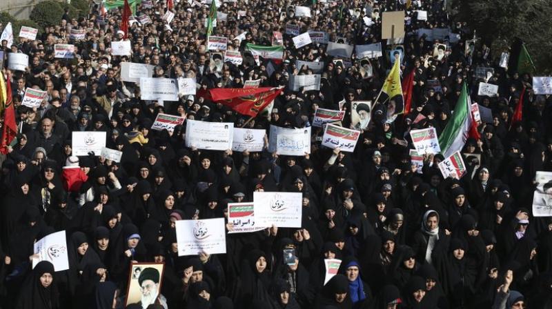 The protests began in Mashhad against high living costs and the struggling economy before spreading quickly to other areas and turning against the Islamic regime as a whole. (Photo: AP) The protests began in Mashhad against high living costs and the struggling economy before spreading quickly to other areas and turning against the Islamic regime as a whole. (Photo: AP)