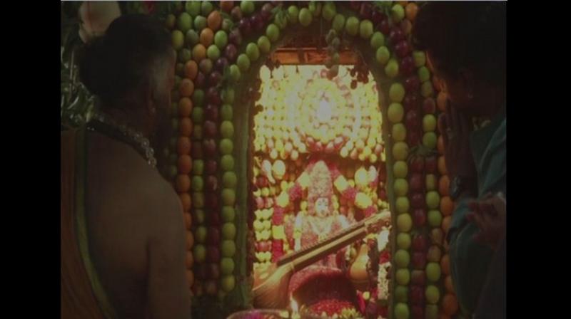 More than 28 varieties of fruits were seen gracing the walls of the temple and adorning the idols. Garlands and offerings made of fruits were extended by the devotees queued up at the Mahali Amman Temple during the pooja. (Photo: ANI) More than 28 varieties of fruits were seen gracing the walls of the temple and adorning the idols. Garlands and offerings made of fruits were extended by the devotees queued up at the Mahali Amman Temple during the pooja. (Photo: ANI)