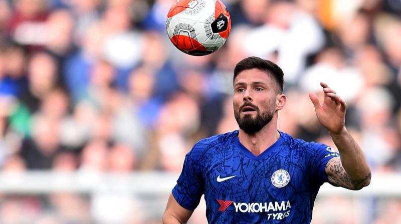 Chelseas French striker Olivier Giroud controls the ball during the English Premier League football match between Chelsea and Tottenham Hotspur at Stamford Bridge in London on February 22 2020. (AFP)