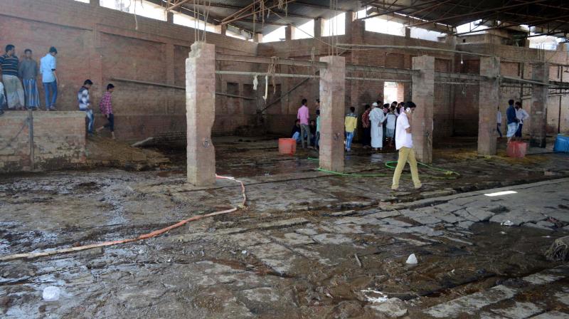 An illegal slaughterhouse in Choka Ghat area of Varanasi which was sealed by the authorities. (Photo: PTI) An illegal slaughterhouse in Choka Ghat area of Varanasi which was sealed by the authorities. (Photo: PTI)