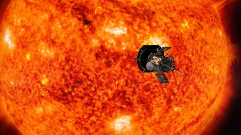 This illustration from NASA shows the Parker Solar Probe spacecraft approaching the sun. Launched in August 2018, the spacecraft will get a gravity assist on October 3, 2018, as it passes within 1,500 miles of Venus. (Steve Gribben/Johns Hopkins APL/NASA via AP) This illustration from NASA shows the Parker Solar Probe spacecraft approaching the sun. Launched in August 2018, the spacecraft will get a gravity assist on October 3, 2018, as it passes within 1,500 miles of Venus. (Steve Gribben/Johns Hopkins APL/NASA via AP)