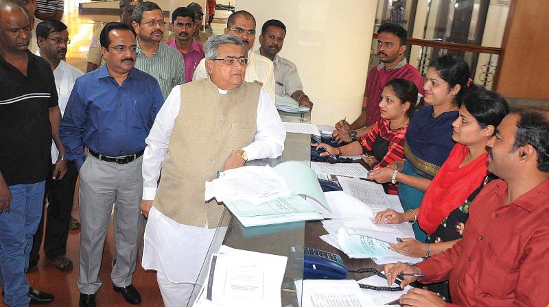 Assembly Speaker K.B. Koliwad speaks to the staff at the information centre after inaugurating it at Suvarna Vidhana Soudha, in Belagavi on Sunday (Photo: DC) Assembly Speaker K.B. Koliwad speaks to the staff at the information centre after inaugurating it at Suvarna Vidhana Soudha, in Belagavi on Sunday (Photo: DC)