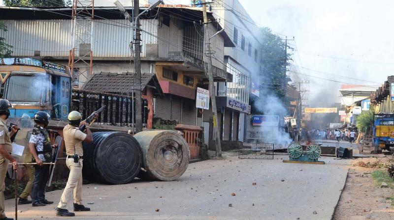 Police seen firing at protesters in Mangaluru on Thursday (Photo: KPN)