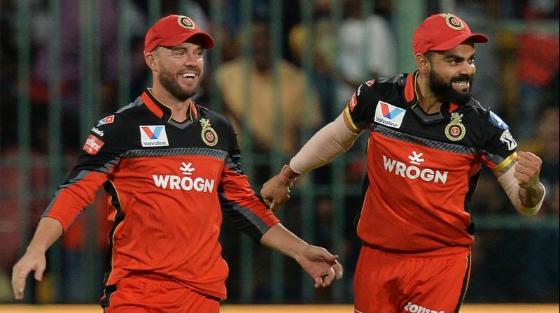 File picture shows Royal Challengers Bangalore captain Virat Kohli and AB De Villiers. — AFP photo File picture shows Royal Challengers Bangalore captain Virat Kohli and AB De Villiers. — AFP photo
