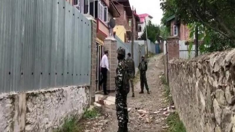 Security personnel were posted outside the four locations during the raids. (Photo: ANI) Security personnel were posted outside the four locations during the raids. (Photo: ANI)