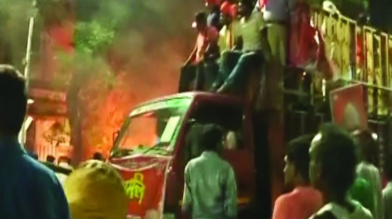 Violence during BJP president Amit Shah’s roadshow in Kolkata on Tuesday (Photo: AP) Violence during BJP president Amit Shah’s roadshow in Kolkata on Tuesday (Photo: AP)