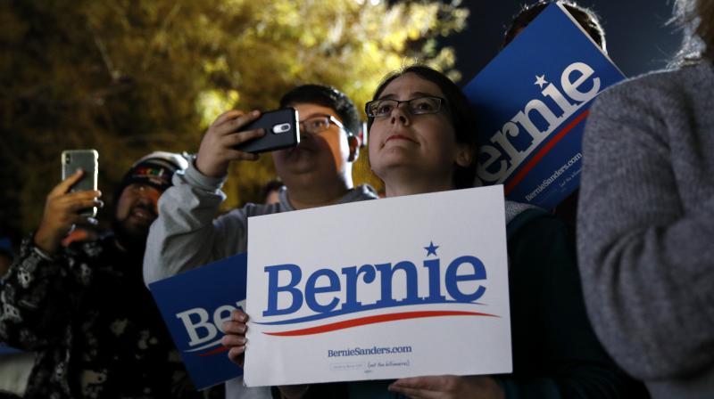 Attendees listen during a campaign event for Democratic presidential candidate Sen. Bernie Sanders, I-Vt., at Springs Preserve in Las Vegas. AP Photo