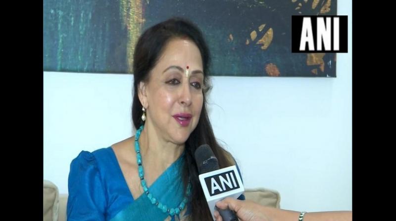 Good works of mine and that of Prime Minister Narendra Modi led NDA government at the Centre will help me win this Lok Sabha election again, said actor-turned-politician Hema Malini on Saturday. (Photo: ANI) Good works of mine and that of Prime Minister Narendra Modi led NDA government at the Centre will help me win this Lok Sabha election again, said actor-turned-politician Hema Malini on Saturday. (Photo: ANI)