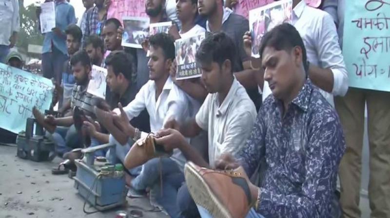'It will be a black day for the families of those children who lost their life due to Encephalitis in Bihar. We will acquire whatever we get after polishing shoes and give it for the treatment of children,' he said. (Photo: ANI) 'It will be a black day for the families of those children who lost their life due to Encephalitis in Bihar. We will acquire whatever we get after polishing shoes and give it for the treatment of children,' he said. (Photo: ANI)