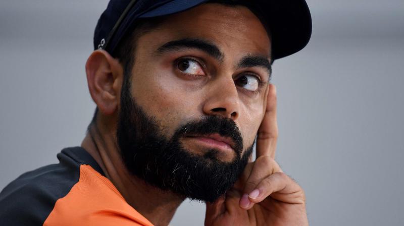 Virat Kohli might have come under sharp criticism from various quarters for his on-field aggressive behaviour but former Australia spinner Brad Hogg Saturday defended the India captain, saying the visiting team derives energy from him. (Photo: AFP) Virat Kohli might have come under sharp criticism from various quarters for his on-field aggressive behaviour but former Australia spinner Brad Hogg Saturday defended the India captain, saying the visiting team derives energy from him. (Photo: AFP)