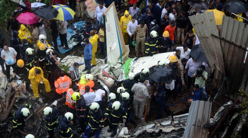A 12-seater aircraft crashed in a crowded Mumbai suburb on Thursday killing 5, including four on board and a pedestrian. (Photo: Shripad Naik) A 12-seater aircraft crashed in a crowded Mumbai suburb on Thursday killing 5, including four on board and a pedestrian. (Photo: Shripad Naik)