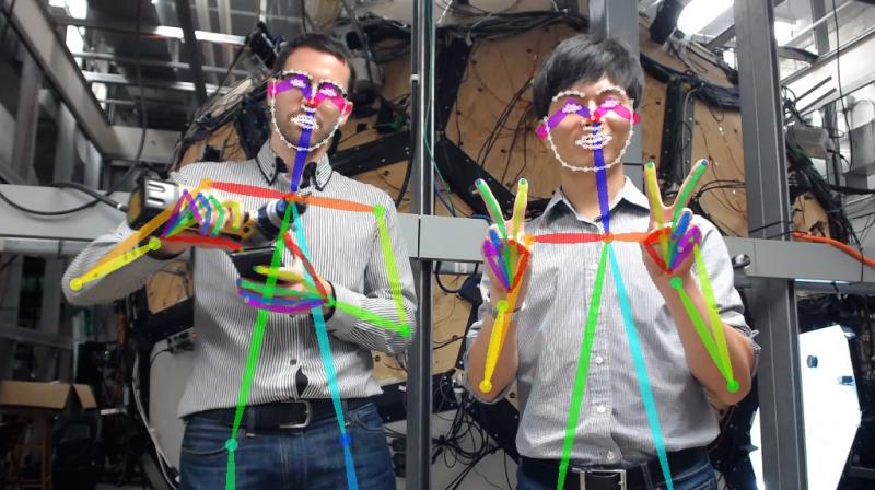 This real-time detector sees hand poses and tracks multiple people. (Image: Carnegie Mellon University) This real-time detector sees hand poses and tracks multiple people. (Image: Carnegie Mellon University)