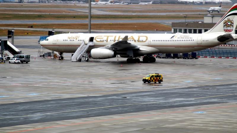 He climbed the fence and sneaked on to the runway, to try and enter a plane (Photo: AFP) He climbed the fence and sneaked on to the runway, to try and enter a plane (Photo: AFP)