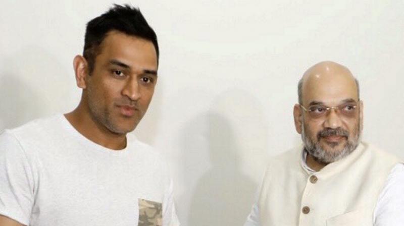 “As part of ‘Sampark for Samarthan’ initiative, met MS Dhoni, one of the greatest finishers in world cricket. Shared with him several transformative initiatives and unprecedented work done by Prime Minister Narendra Modi’s govt in the last 4 years,” Amit Shah tweeted about his meeting with MS Dhoni. (Photo: PTI) “As part of ‘Sampark for Samarthan’ initiative, met MS Dhoni, one of the greatest finishers in world cricket. Shared with him several transformative initiatives and unprecedented work done by Prime Minister Narendra Modi’s govt in the last 4 years,” Amit Shah tweeted about his meeting with MS Dhoni. (Photo: PTI)