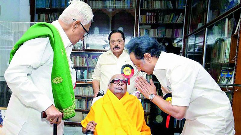 MK Stalin seeks blessings of the DMK patriarch M. Karunanidhi after being elected as the working president at the party’s general council meeting, in Chennai on Wednesday. (Photo: PTI) MK Stalin seeks blessings of the DMK patriarch M. Karunanidhi after being elected as the working president at the party’s general council meeting, in Chennai on Wednesday. (Photo: PTI)
