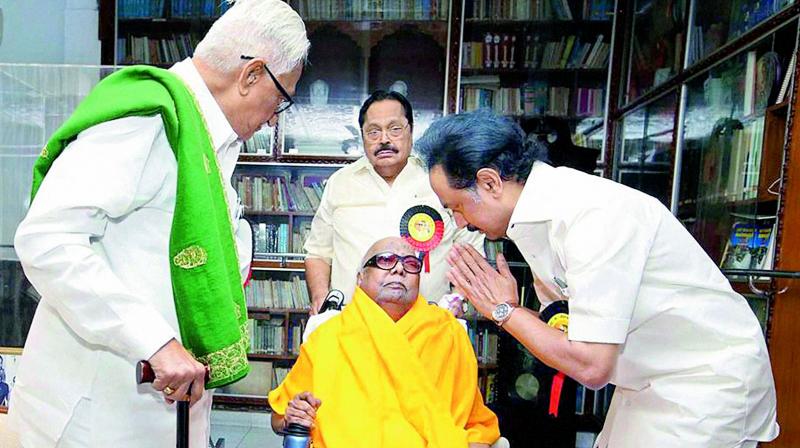 MK Stalin seeks blessings of the DMK patriarch M. Karunanidhi after being elected as the working president at the party’s general council meeting, in Chennai on Wednesday. (Photo: PTI) MK Stalin seeks blessings of the DMK patriarch M. Karunanidhi after being elected as the working president at the party’s general council meeting, in Chennai on Wednesday. (Photo: PTI)