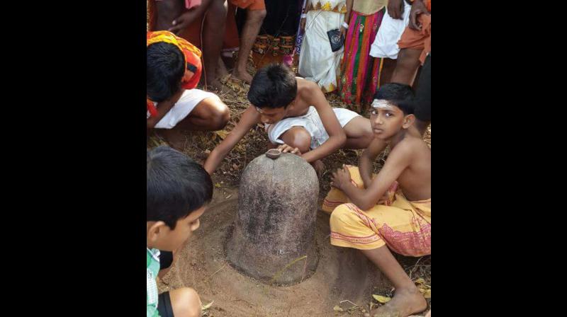 A Shiva Lingam reinstated at the paddy filed near Keezhthali Temple, which is the proposed location of the open Shiva Temple in Thali Village. A Shiva Lingam reinstated at the paddy filed near Keezhthali Temple, which is the proposed location of the open Shiva Temple in Thali Village.