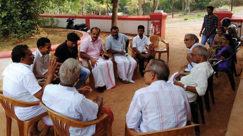 Temple committee felicitates Nambiarthodi Ali (extreme left) in a meeting. Temple committee felicitates Nambiarthodi Ali (extreme left) in a meeting.
