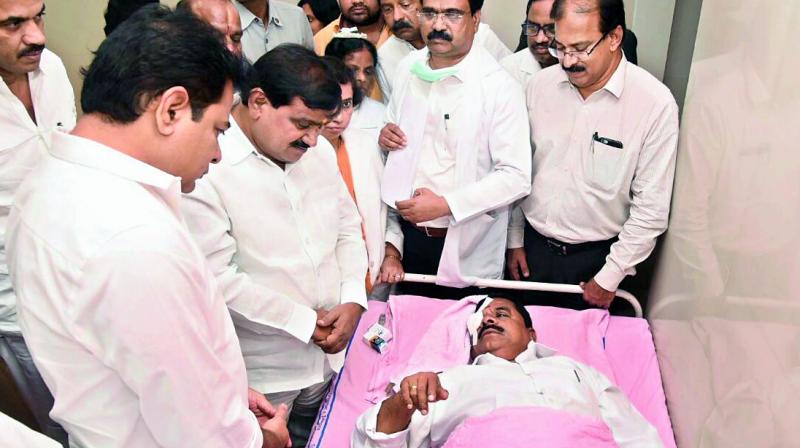 Council Chairman Swamy Goud being treated by doctors after he was injured in the assembly. KTR and others rush to Sarojini Devi eye hospital to enquire about his health condition. (Photo: BHMK Gandhi) Council Chairman Swamy Goud being treated by doctors after he was injured in the assembly. KTR and others rush to Sarojini Devi eye hospital to enquire about his health condition. (Photo: BHMK Gandhi)