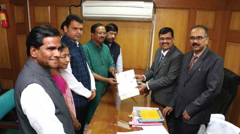 Former BJP state president V. Muraleedharan files his nomination papers for Rajya Sabha polls from Maharashtra before the legislative assembly deputy secretary Vilas Athawale on Monday. Also seen are Maharashtra Chief Minister Devendra Fadnavis, Maharashtra state BJP president Raosaheb Patil Danveand and Mr Muraleedharan’s wife Dr K. S. Jayashree among others. Former BJP state president V. Muraleedharan files his nomination papers for Rajya Sabha polls from Maharashtra before the legislative assembly deputy secretary Vilas Athawale on Monday. Also seen are Maharashtra Chief Minister Devendra Fadnavis, Maharashtra state BJP president Raosaheb Patil Danveand and Mr Muraleedharan’s wife Dr K. S. Jayashree among others.