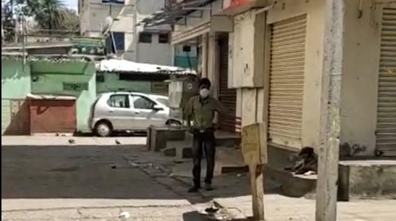 The young man from Puttenahalli, Bengaluru, stands outside the Wilson Garden police station in Bengaluru.