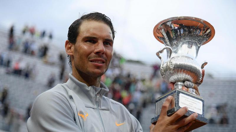 Rafa Nadal returned to the top of the world rankings on Monday after winning his eighth Italian Open title at the weekend to confirm once more his status as the king of the clay court. (Photo: AFP) Rafa Nadal returned to the top of the world rankings on Monday after winning his eighth Italian Open title at the weekend to confirm once more his status as the king of the clay court. (Photo: AFP)