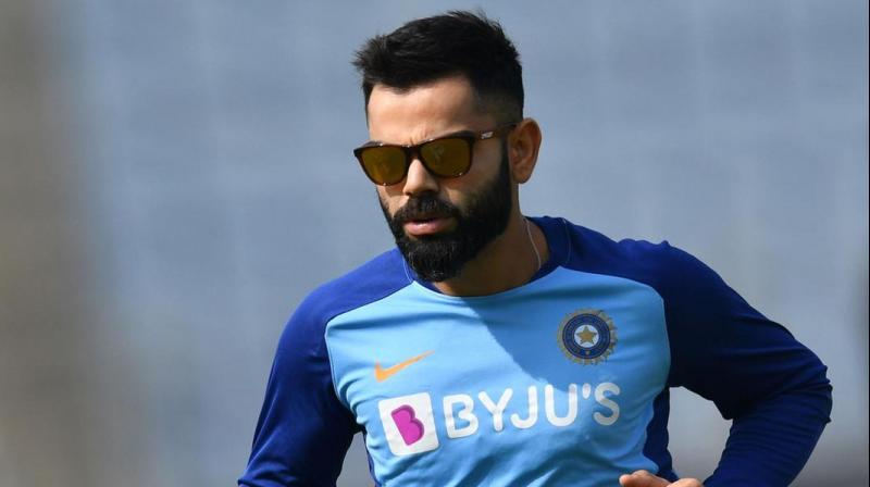 India captain Virat Kohli is preparing himself for a \rigorous three years\ of playing all three formats after which he might reassess his workload amid a \transition phase\ setting in. (Photo:AFP)