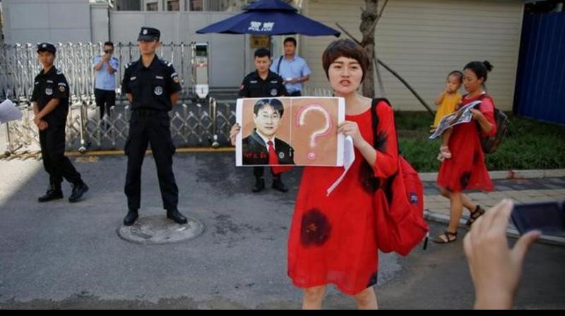 Li Wenzu said that her husband is being detained incommunicado without a proper explanation and they weren’t allowing the family’s lawyer to visit Wang.(Photo: Reuters) Li Wenzu said that her husband is being detained incommunicado without a proper explanation and they weren’t allowing the family’s lawyer to visit Wang.(Photo: Reuters)