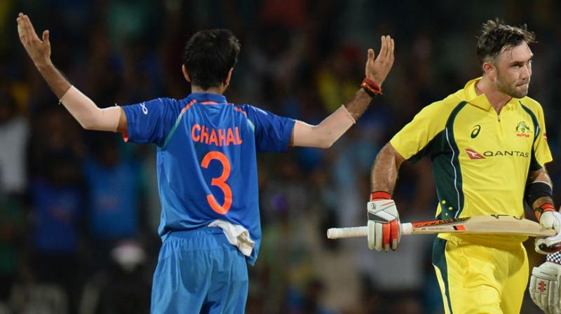 After having dismissed the 28-year-old Maxwell in the first three ODIs, Yuzvendra Chahal was at it again, as a catch by Jasprit Bumrah at short midwicket in the seventh over saw off the right-handed batsman.(Photo: AFP) After having dismissed the 28-year-old Maxwell in the first three ODIs, Yuzvendra Chahal was at it again, as a catch by Jasprit Bumrah at short midwicket in the seventh over saw off the right-handed batsman.(Photo: AFP)