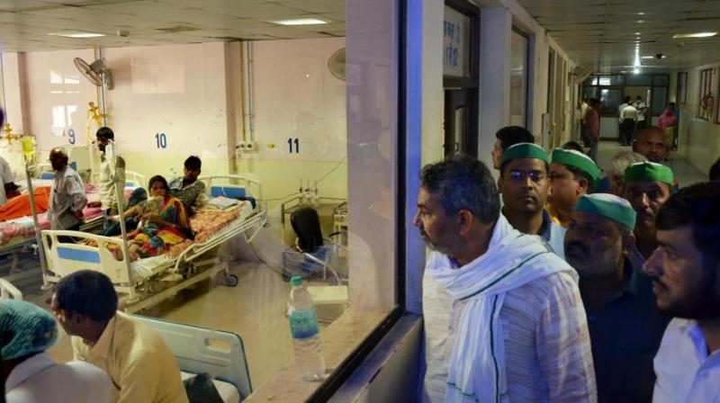 Children receive treatment in the Encephalitis Ward at the Baba Raghav Das Medical College Hospital in Gorakhpur district on August 16, 2017. (Photo: PTI) Children receive treatment in the Encephalitis Ward at the Baba Raghav Das Medical College Hospital in Gorakhpur district on August 16, 2017. (Photo: PTI)