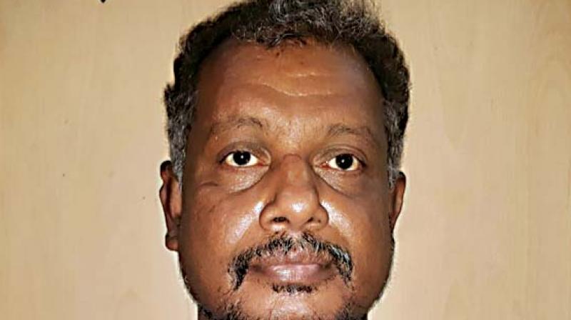 The accused has been identified as T.F. Hadimani, a resident of Vijayanagar in Mysuru. The accused has been identified as T.F. Hadimani, a resident of Vijayanagar in Mysuru.
