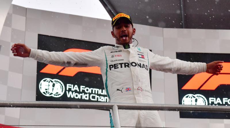 The defending four-time champion took full advantage of a heavy downpour during which title rival and fellow-four-time champion Sebastian Vettel of Ferrari crashed out of contention.(Photo: AFP) The defending four-time champion took full advantage of a heavy downpour during which title rival and fellow-four-time champion Sebastian Vettel of Ferrari crashed out of contention.(Photo: AFP)