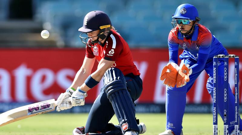 Captain Heather Knight's maiden T20 International century helped England notch up a record-breaking 98-run victory over debutants Thailand in the ICC Women's T20 World Cup here on Wednesday. (Photo:AFP) Captain Heather Knight's maiden T20 International century helped England notch up a record-breaking 98-run victory over debutants Thailand in the ICC Women's T20 World Cup here on Wednesday. (Photo:AFP)