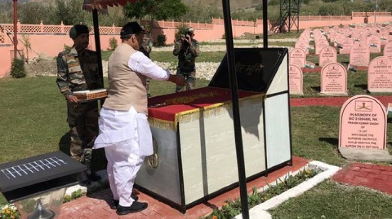 The Defence Minister reached Srinagar earlier today and headed towards Drass, where he also met officials and clicked pictures with them. (photo: ANI) The Defence Minister reached Srinagar earlier today and headed towards Drass, where he also met officials and clicked pictures with them. (photo: ANI)