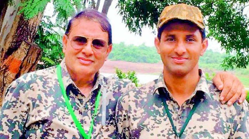 Nawab Shafath Ali Khan along with his son Asag Ali, who killed the tigress, Avni. Nawab Shafath Ali Khan along with his son Asag Ali, who killed the tigress, Avni.