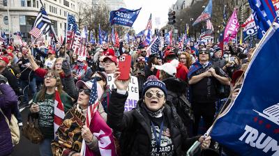 People gather in support of President Donald Trump and in protest the outcome of the 2020 presidential election at freedom plaza on December 12, 2020 in Washington, DC. (Tasos Katopodis/Getty Images/AFP)