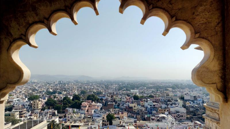 The city of Udaipur framed from the city palace The city of Udaipur framed from the city palace