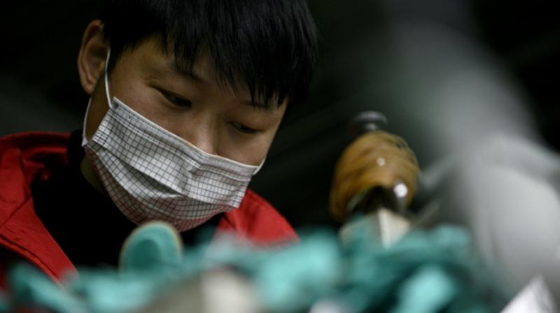 Coronavirus could push world economic growth into reverse (AFP) Coronavirus could push world economic growth into reverse (AFP)