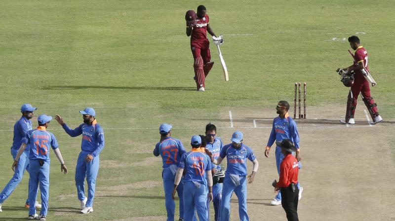 With comprehensive back-to-back victories in the second and third ODIs, it seems like a mere formality as Virat Kohli and his men are slowly inching towards a complete rout of their opposition despite the first game being abandoned.(Photo: AP) With comprehensive back-to-back victories in the second and third ODIs, it seems like a mere formality as Virat Kohli and his men are slowly inching towards a complete rout of their opposition despite the first game being abandoned.(Photo: AP)