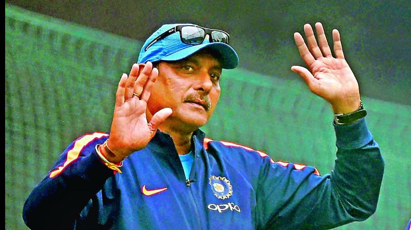 Ravi Shastri and MS Dhoni. (Photo: File) Ravi Shastri and MS Dhoni. (Photo: File)