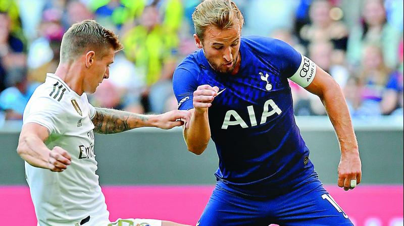 Real Madrid’s German midfielder Toni Kroos (left) vies for the ball with Tottenham Hotspur’s English striker Harry Kane during the Audi Cup football match in Munich, Germany, on Tuesday. Tottenham won 1-0. (Photo: AFP) Real Madrid’s German midfielder Toni Kroos (left) vies for the ball with Tottenham Hotspur’s English striker Harry Kane during the Audi Cup football match in Munich, Germany, on Tuesday. Tottenham won 1-0. (Photo: AFP)