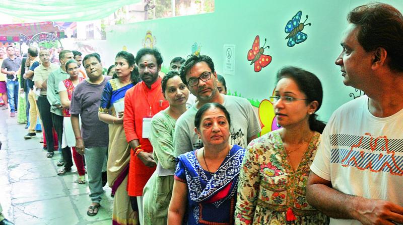 Secunderabad BJP MP candidate G. Kishan Reddy waits in the queue after the EVMs stopped working for an hour on Thursday morning. (Photo: DEEPAK DESHPANDE) Secunderabad BJP MP candidate G. Kishan Reddy waits in the queue after the EVMs stopped working for an hour on Thursday morning. (Photo: DEEPAK DESHPANDE)