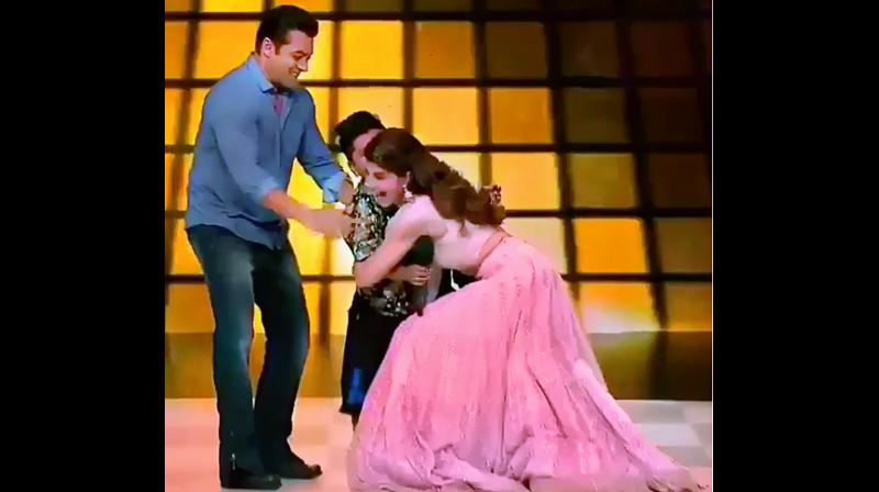 Salman Khan and Jacqueline Fernandez with seven-year-old participant Siddhant. Salman Khan and Jacqueline Fernandez with seven-year-old participant Siddhant.
