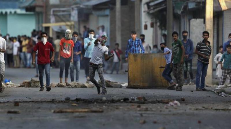 Internet services were suspended to prevent rumours from spreading, after Hizbul Mujahideen commander Sabzar Ahmad Bhat and his accomplice Faizan Ahmad were killed in a gunfight with security forces in Saimoh village of south Kashmir's Pulwama district. (Photo: AP) Internet services were suspended to prevent rumours from spreading, after Hizbul Mujahideen commander Sabzar Ahmad Bhat and his accomplice Faizan Ahmad were killed in a gunfight with security forces in Saimoh village of south Kashmir's Pulwama district. (Photo: AP)