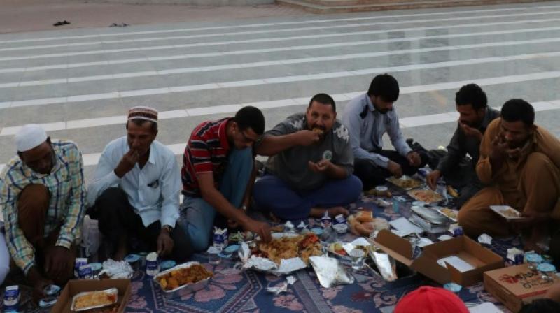 During Ramadan, immigrants in the Gulf state reconnect with traditions from their homeland, especially the rituals of breaking the fast and taking lots of traditional desserts and juices. (Photo: AFP) During Ramadan, immigrants in the Gulf state reconnect with traditions from their homeland, especially the rituals of breaking the fast and taking lots of traditional desserts and juices. (Photo: AFP)