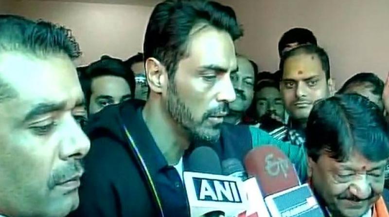 Arjun Rampal adrressing the media after meeting party general secretary Kailash Vijayvargiya. (Photo: Twitter) Arjun Rampal adrressing the media after meeting party general secretary Kailash Vijayvargiya. (Photo: Twitter)