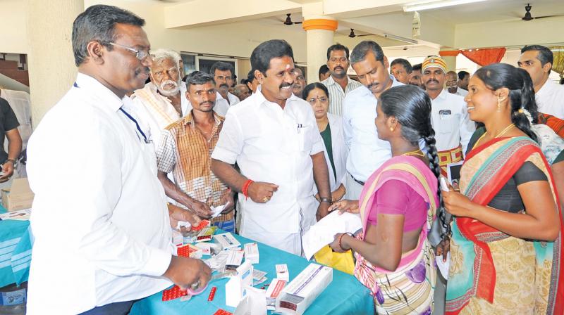 Food minister R.Kamaraj inaugurating the health insurance awareness scheme at Sannanallur village near Tiruvarur on Saturday. (Photo: DC) Food minister R.Kamaraj inaugurating the health insurance awareness scheme at Sannanallur village near Tiruvarur on Saturday. (Photo: DC)