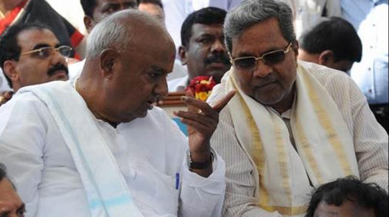 JD(S) supremo H D Deve Gowda with former Karnataka Chief Minister and Congress leader Siddaramaiah. (Photo: File/PTI) JD(S) supremo H D Deve Gowda with former Karnataka Chief Minister and Congress leader Siddaramaiah. (Photo: File/PTI)