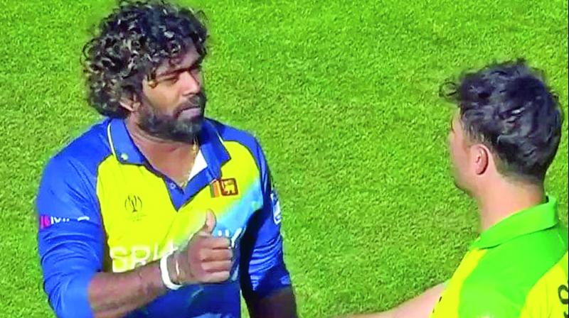Lasith Malinga and Marcus Stoinis. Lasith Malinga and Marcus Stoinis.